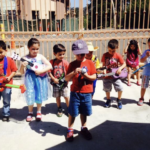 students learning about world geography with Montessori cultural materials