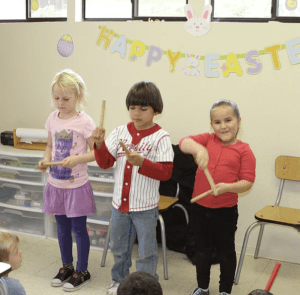 students exploring the solar system using Montessori cosmic education materials