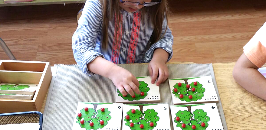 a child using color tablets to explore color shades and gradients