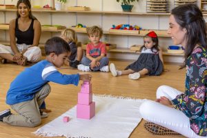 students creating artwork using Montessori open-ended art materials